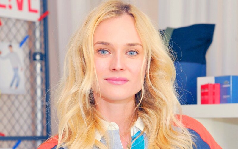 blonde woman in colorful jacket
