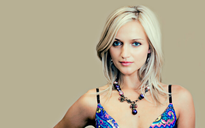 blonde woman in colorful top