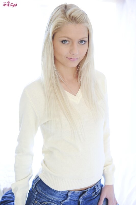 blonde woman in cream sweater