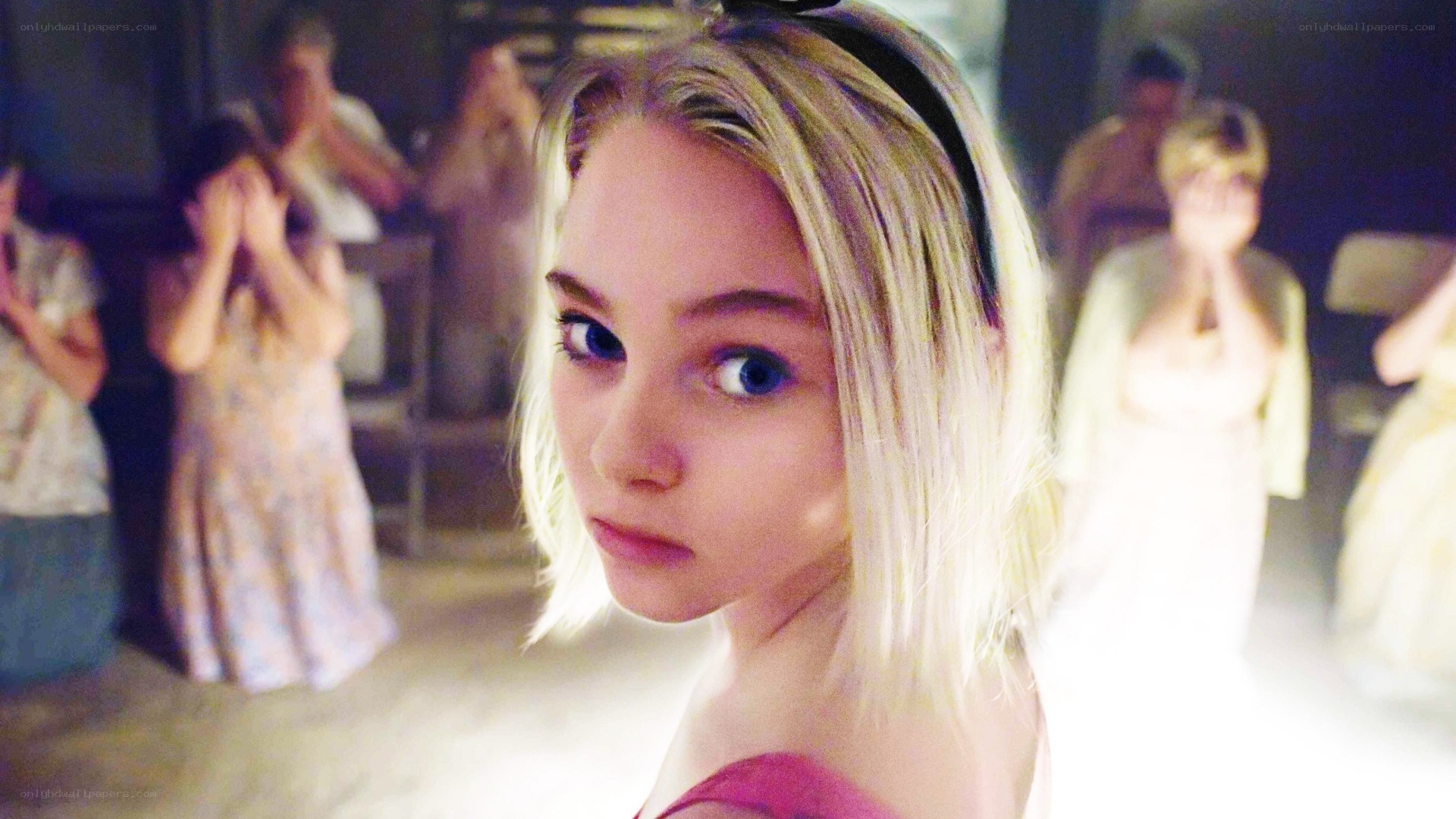 blonde woman in crowd