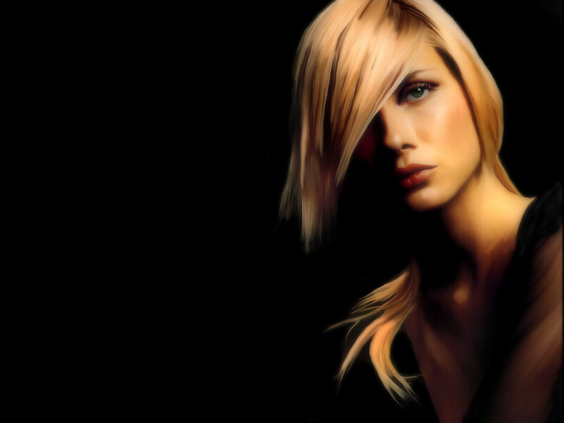 blonde woman in dark portrait