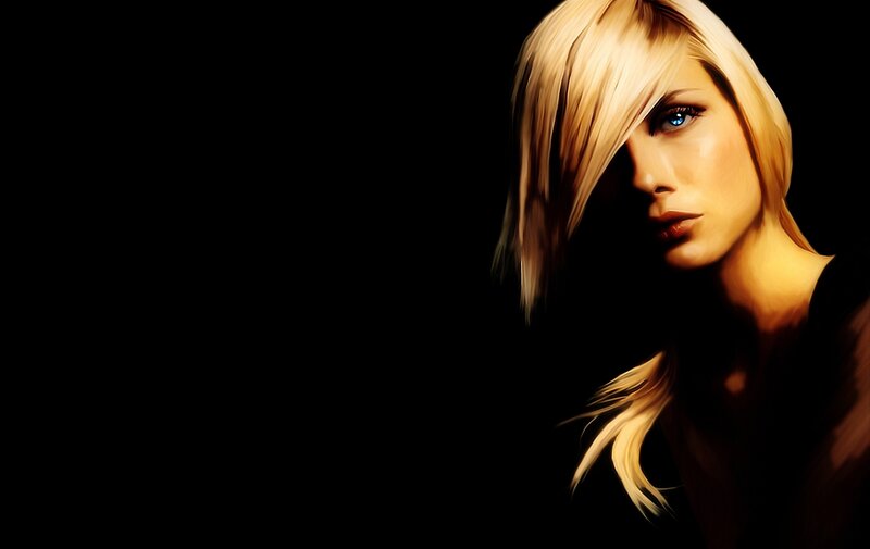 blonde woman in dark setting