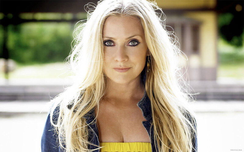 blonde woman in denim jacket