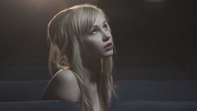 Blonde Woman in Dim Light — Black