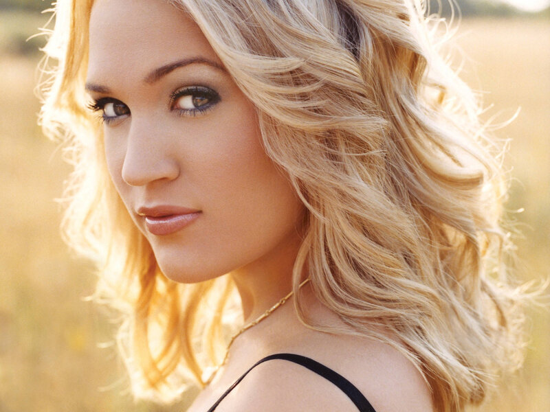 blonde woman in field