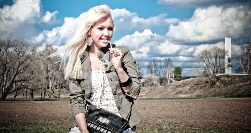 Blonde woman in field
