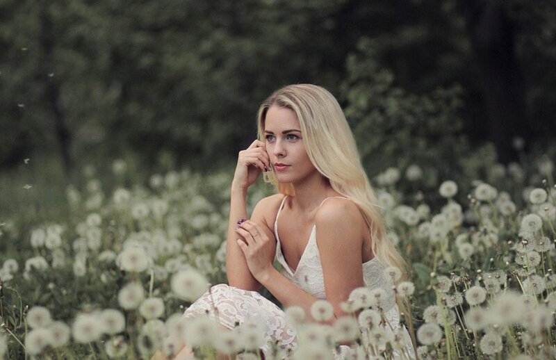 Blonde Woman in Field — White, Serene