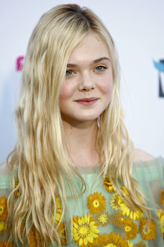 blonde woman in floral dress