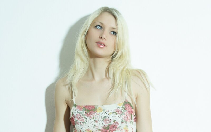 blonde woman in floral dress