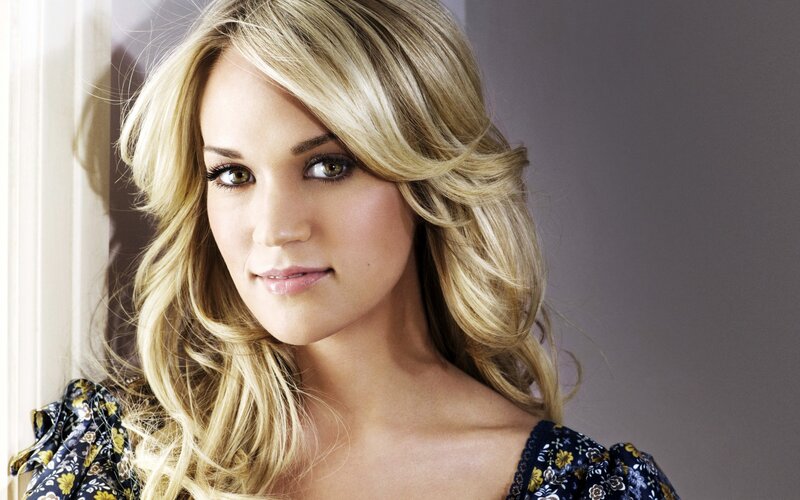 blonde woman in floral dress