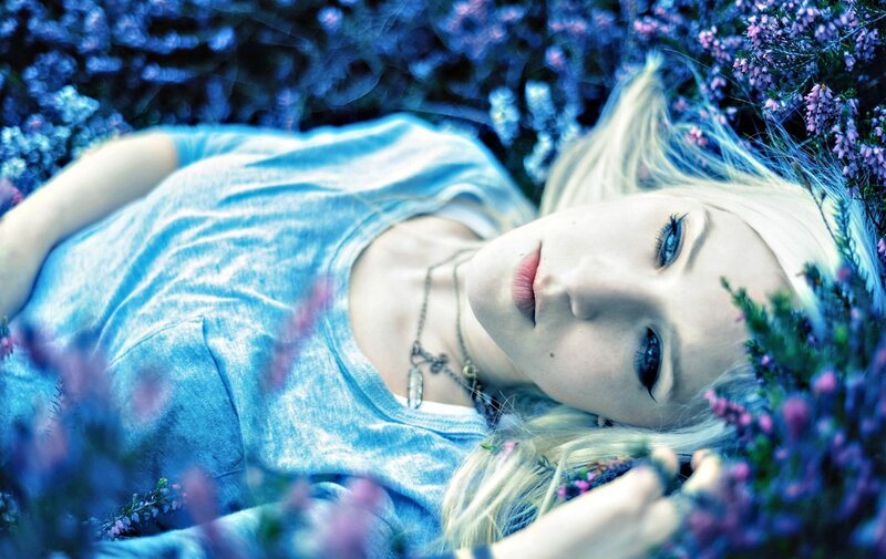 Blonde Woman in Flowers