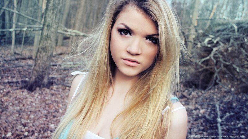 blonde woman in forest