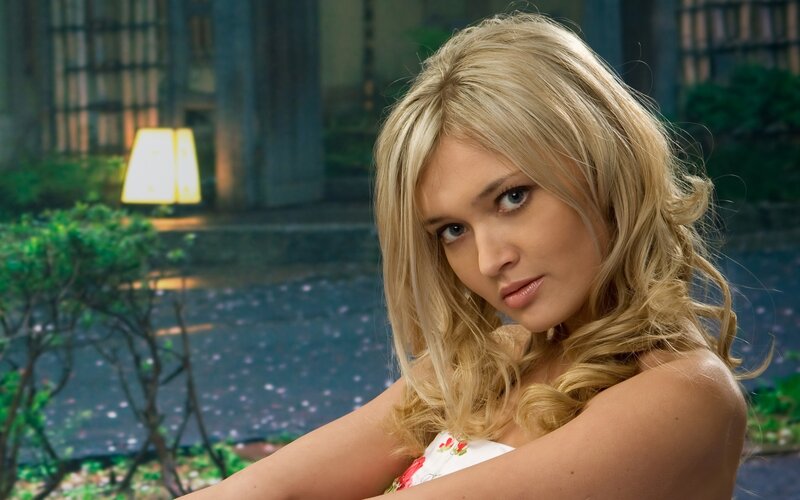 blonde woman in garden