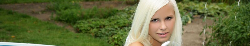 blonde woman in garden