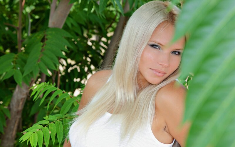 blonde woman in garden