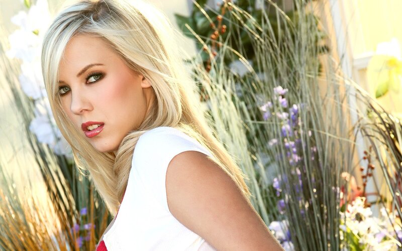 blonde woman in garden