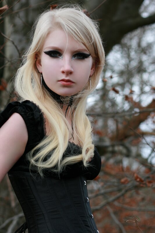 blonde woman in gothic attire