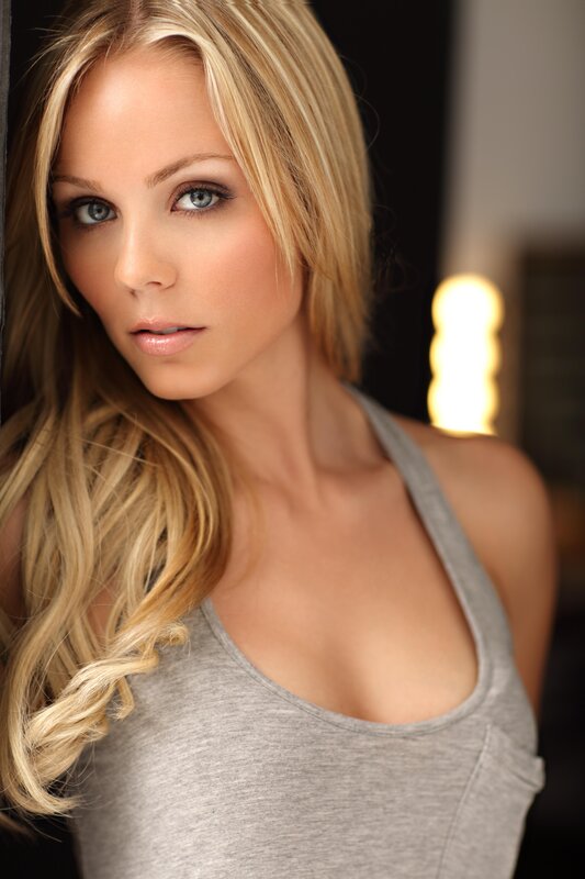 blonde woman in gray tank top