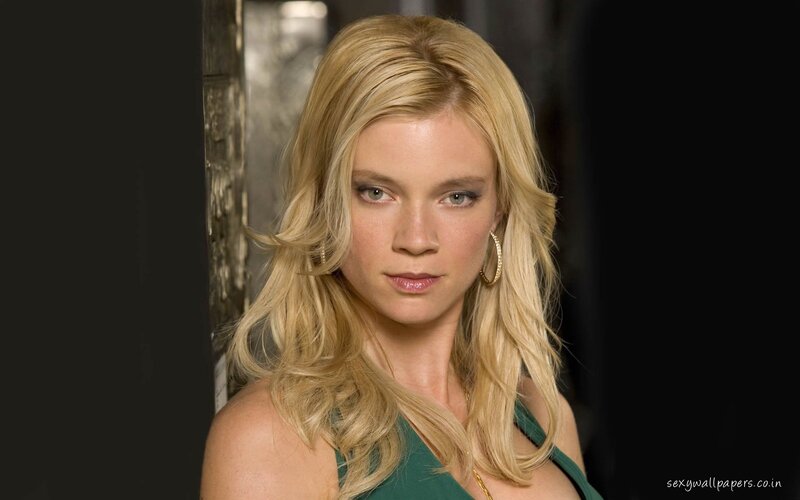 blonde woman in green dress