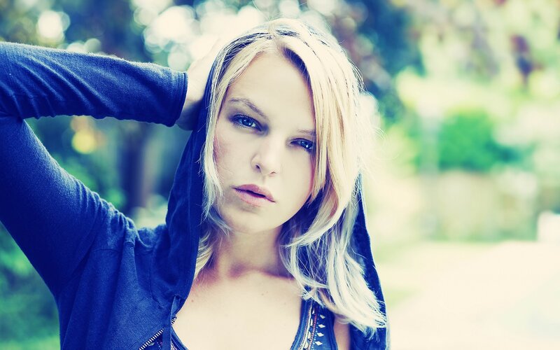 Blonde Woman in Hoodie — Blue, Contemplative