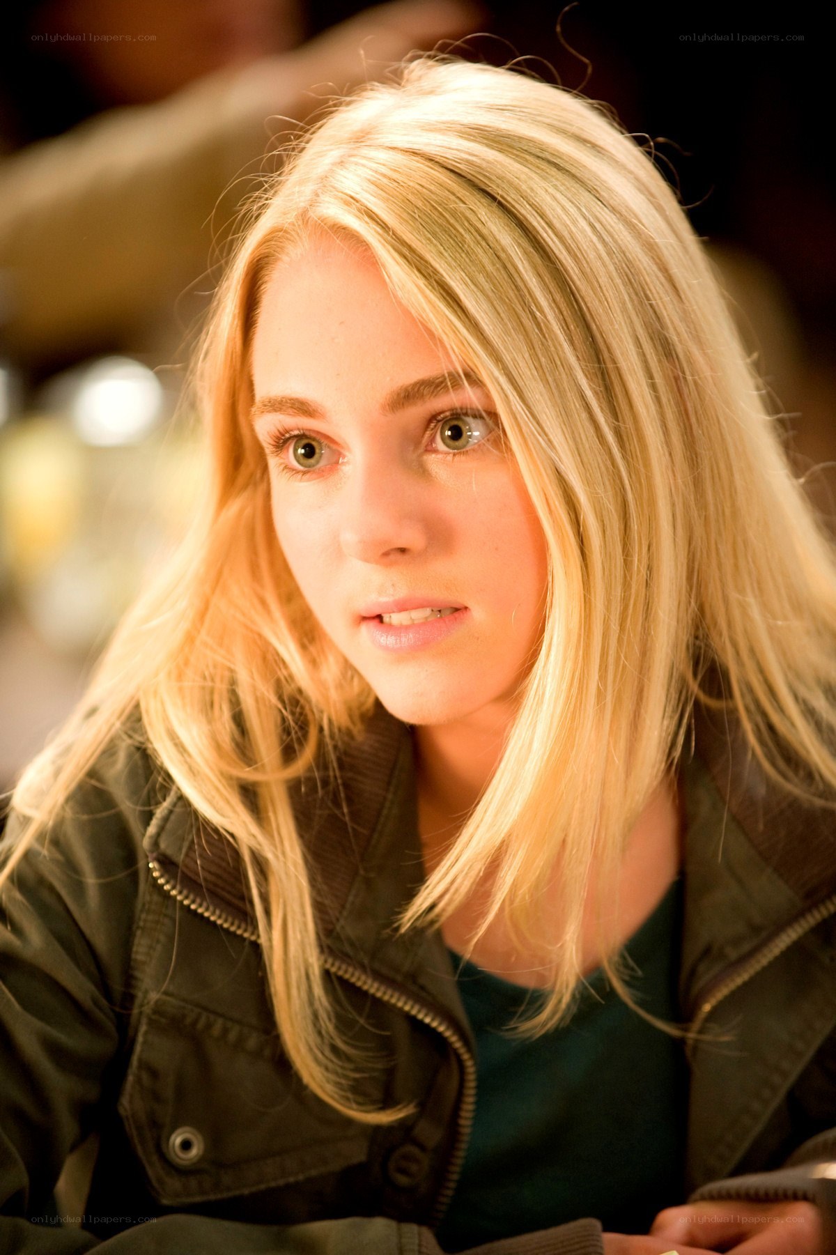 blonde woman in jacket