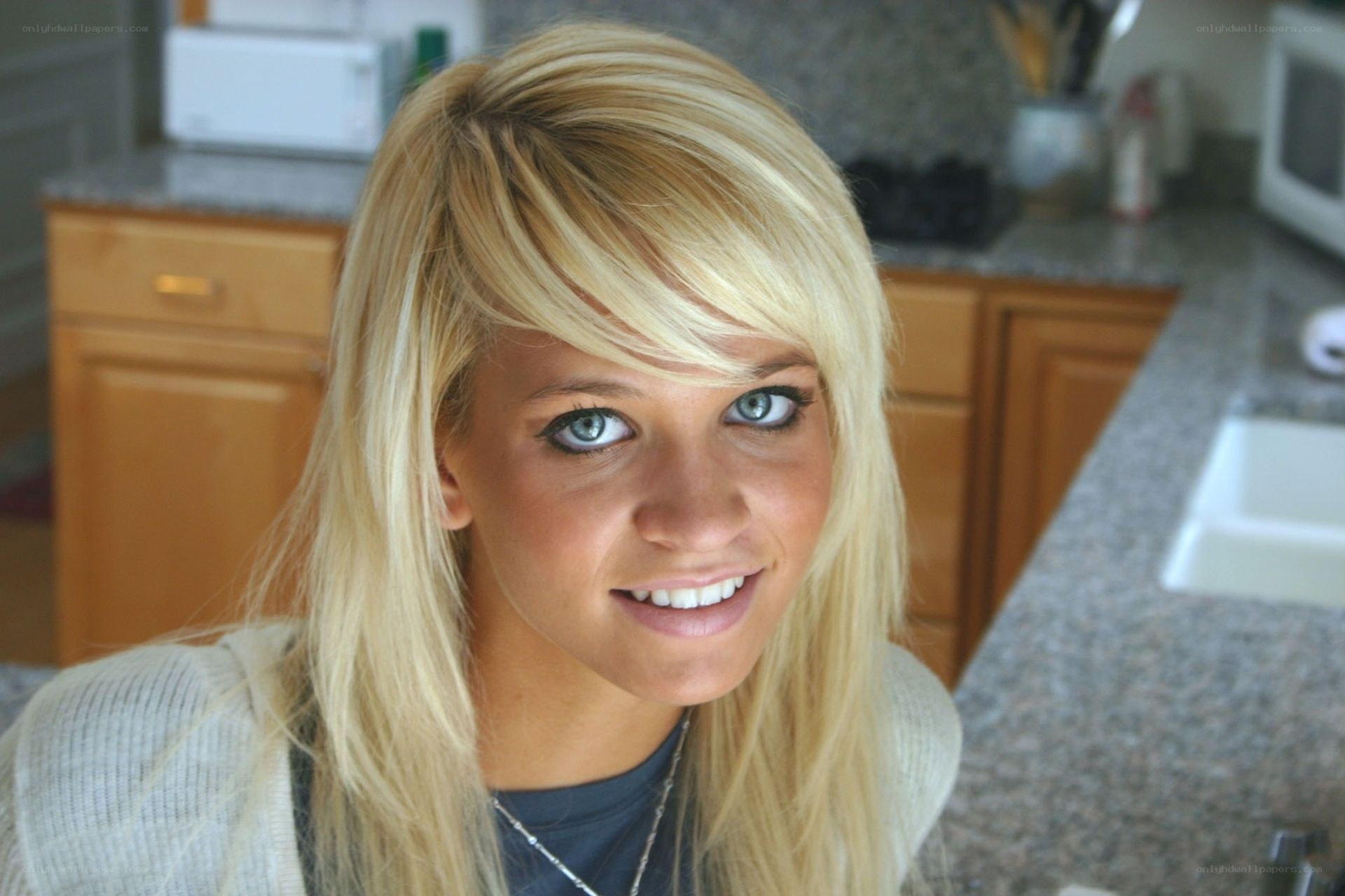 blonde woman in kitchen