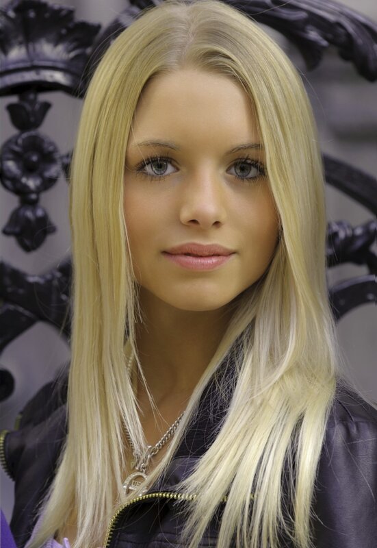 blonde woman in leather jacket