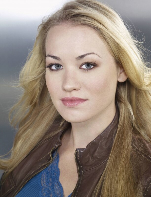 blonde woman in leather jacket