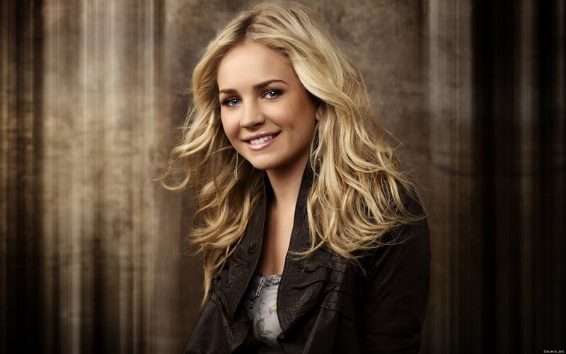 Blonde woman in leather jacket
