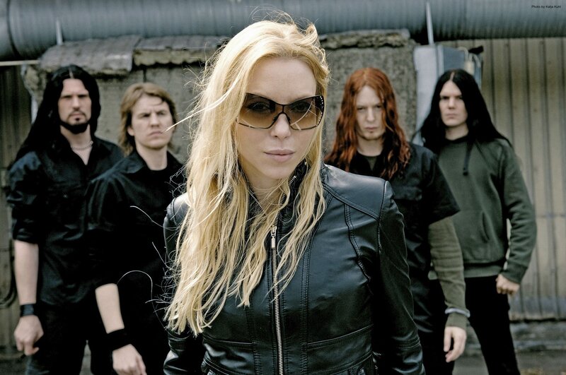 Blonde Woman in Leather Jacket — Black, Serious