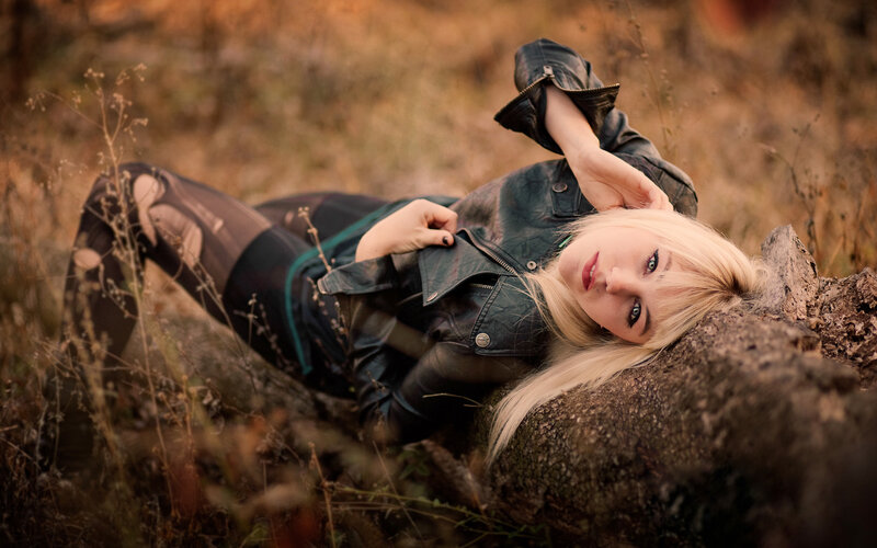 Blonde Woman in Leather Jacket — Brown