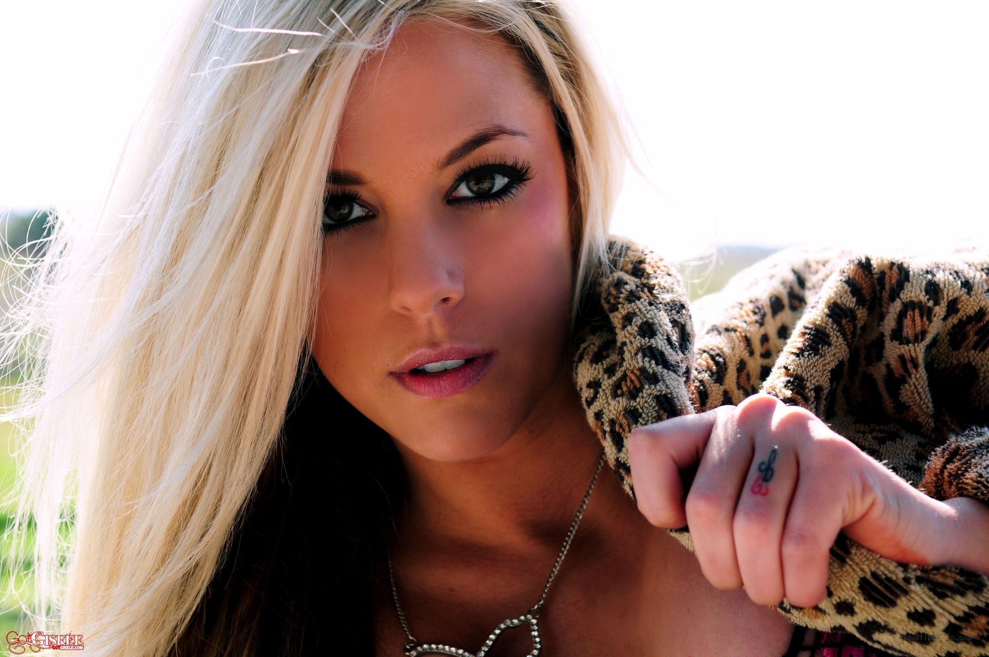 blonde woman in leopard coat