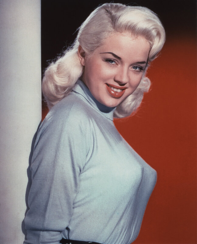 Blonde woman in light blue sweater