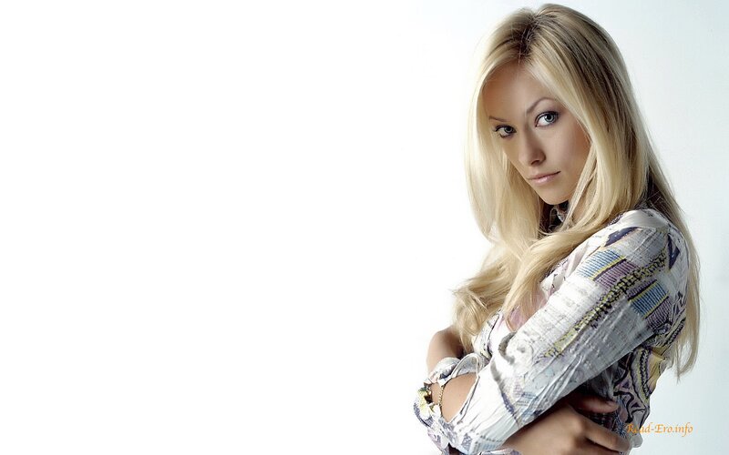blonde woman in patterned shirt