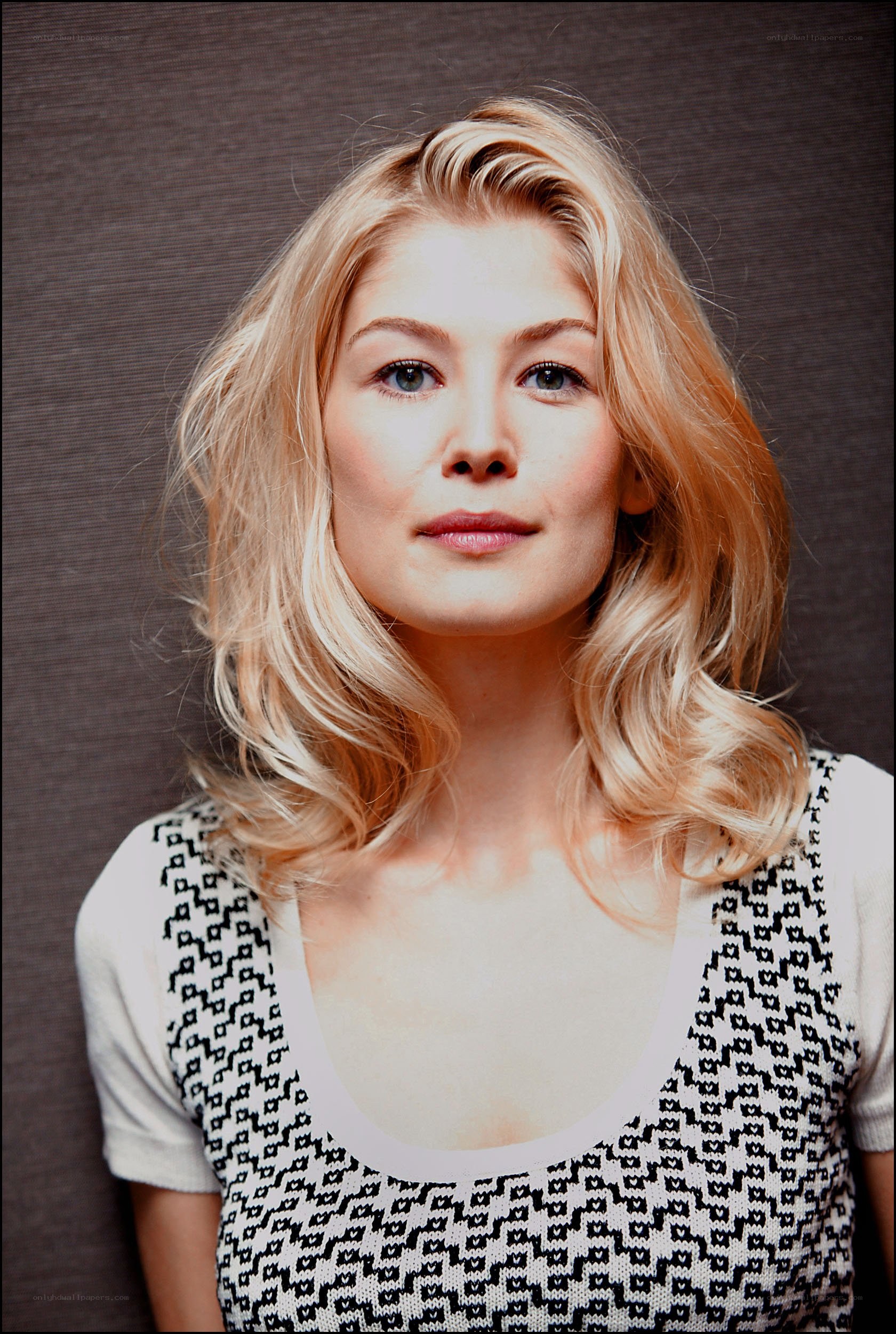blonde woman in patterned top