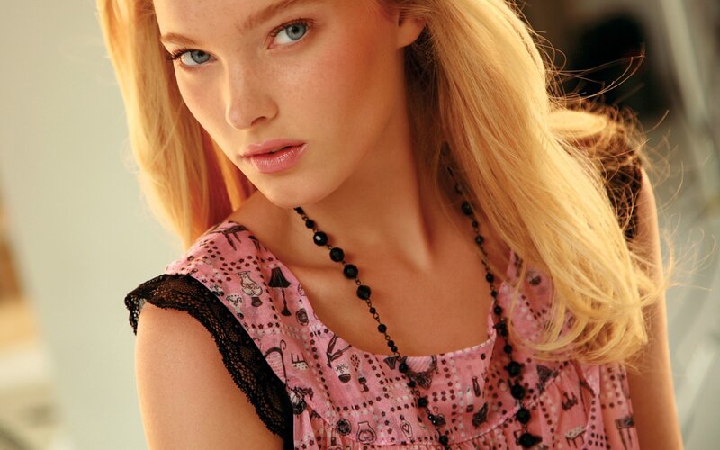 blonde woman in pink dress