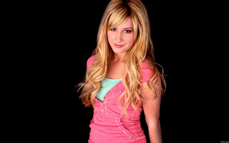 blonde woman in pink top