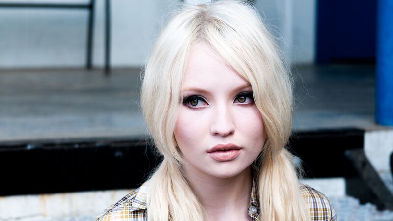 blonde woman in plaid shirt
