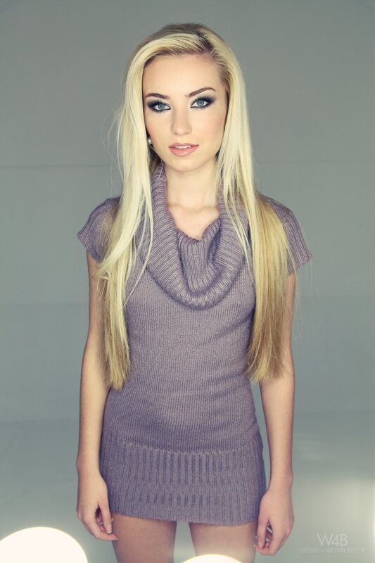blonde woman in purple dress