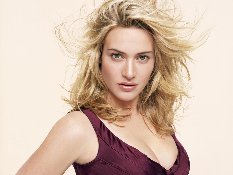 blonde woman in purple dress
