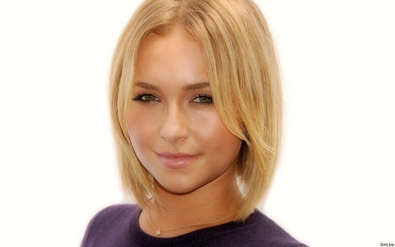 blonde woman in purple sweater