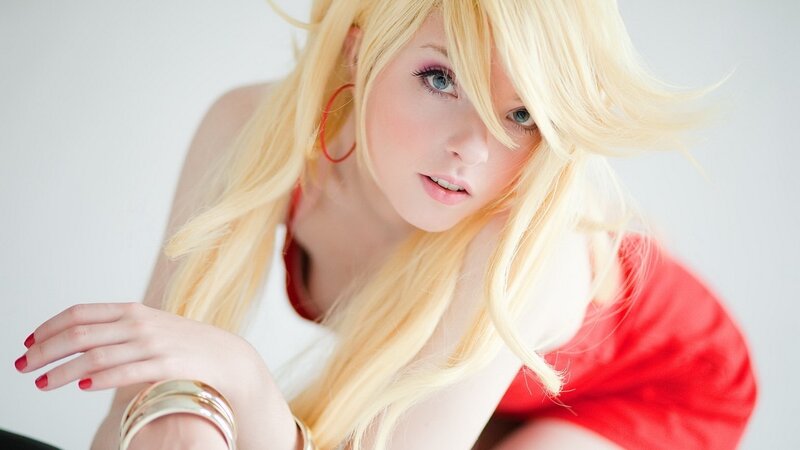 blonde woman in red and white