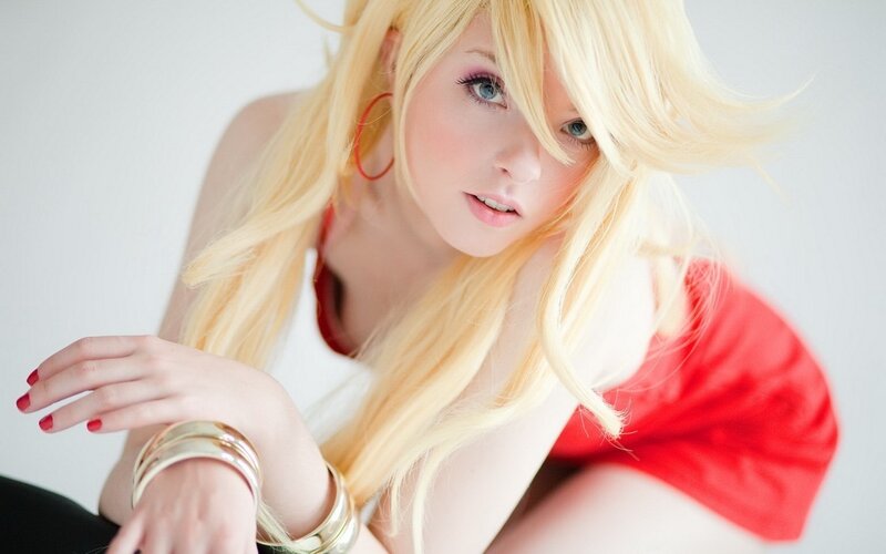 blonde woman in red and white