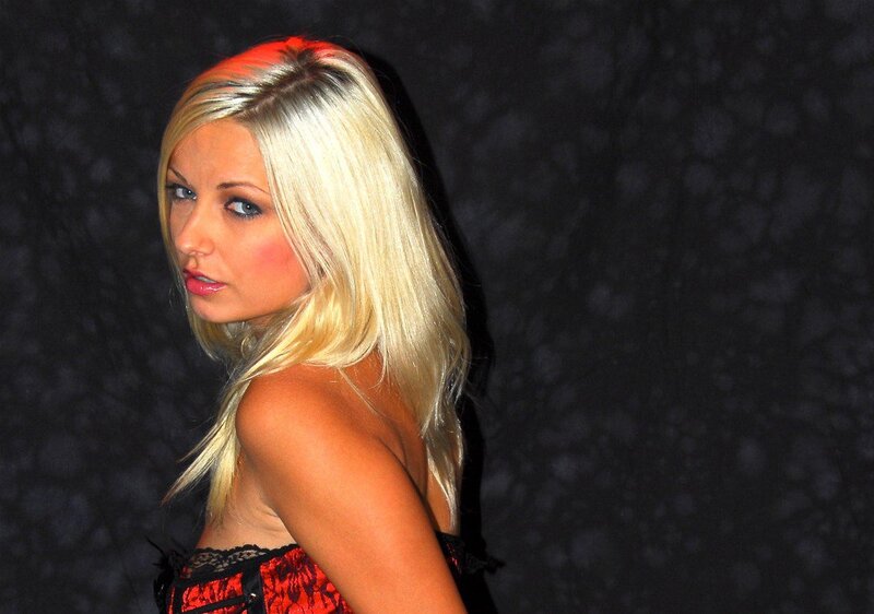 blonde woman in red corset