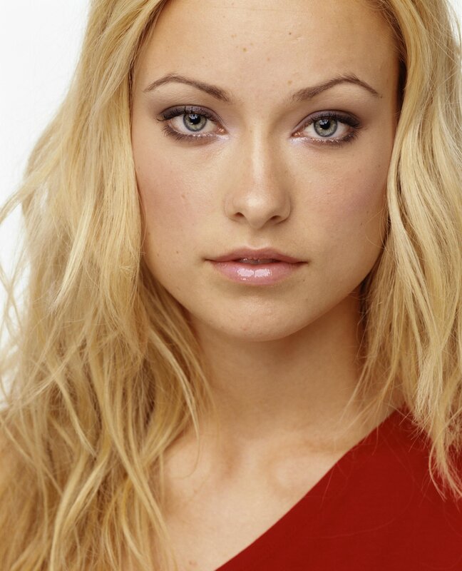 blonde woman in red top