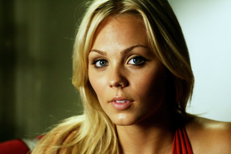 blonde woman in red top