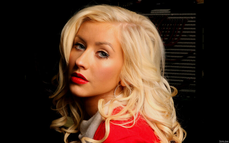 blonde woman in red top