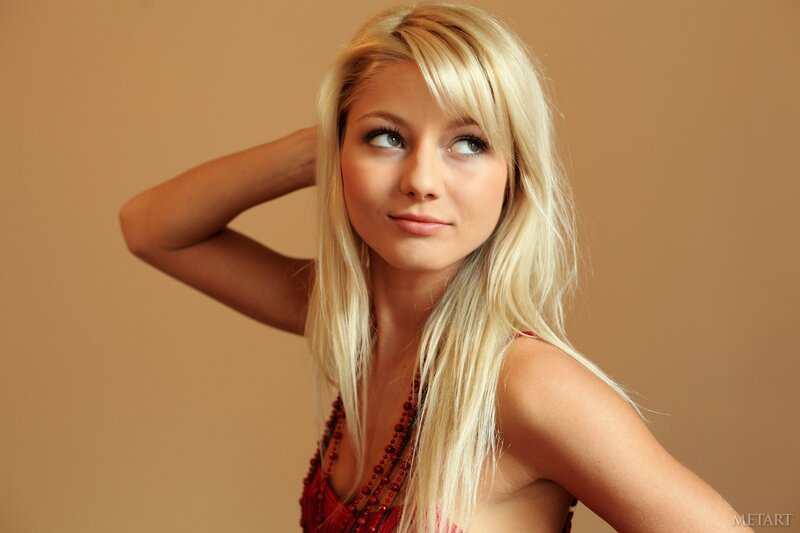 blonde woman in red top