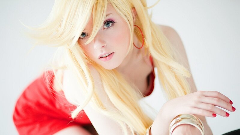 blonde woman in red top