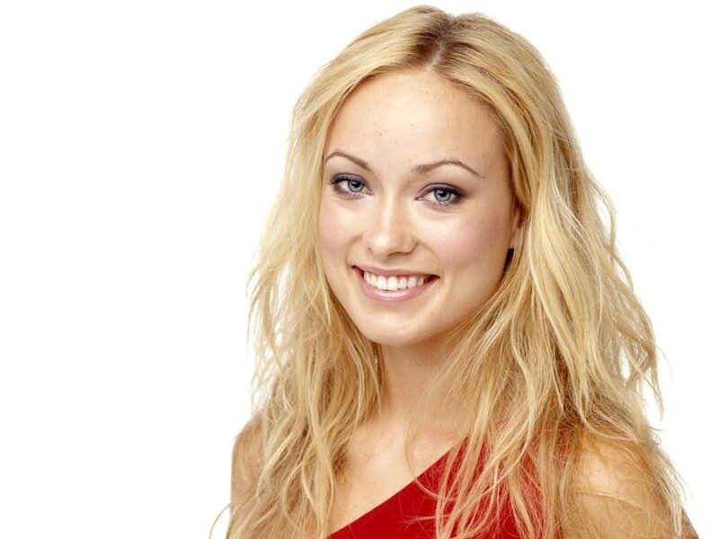 blonde woman in red top